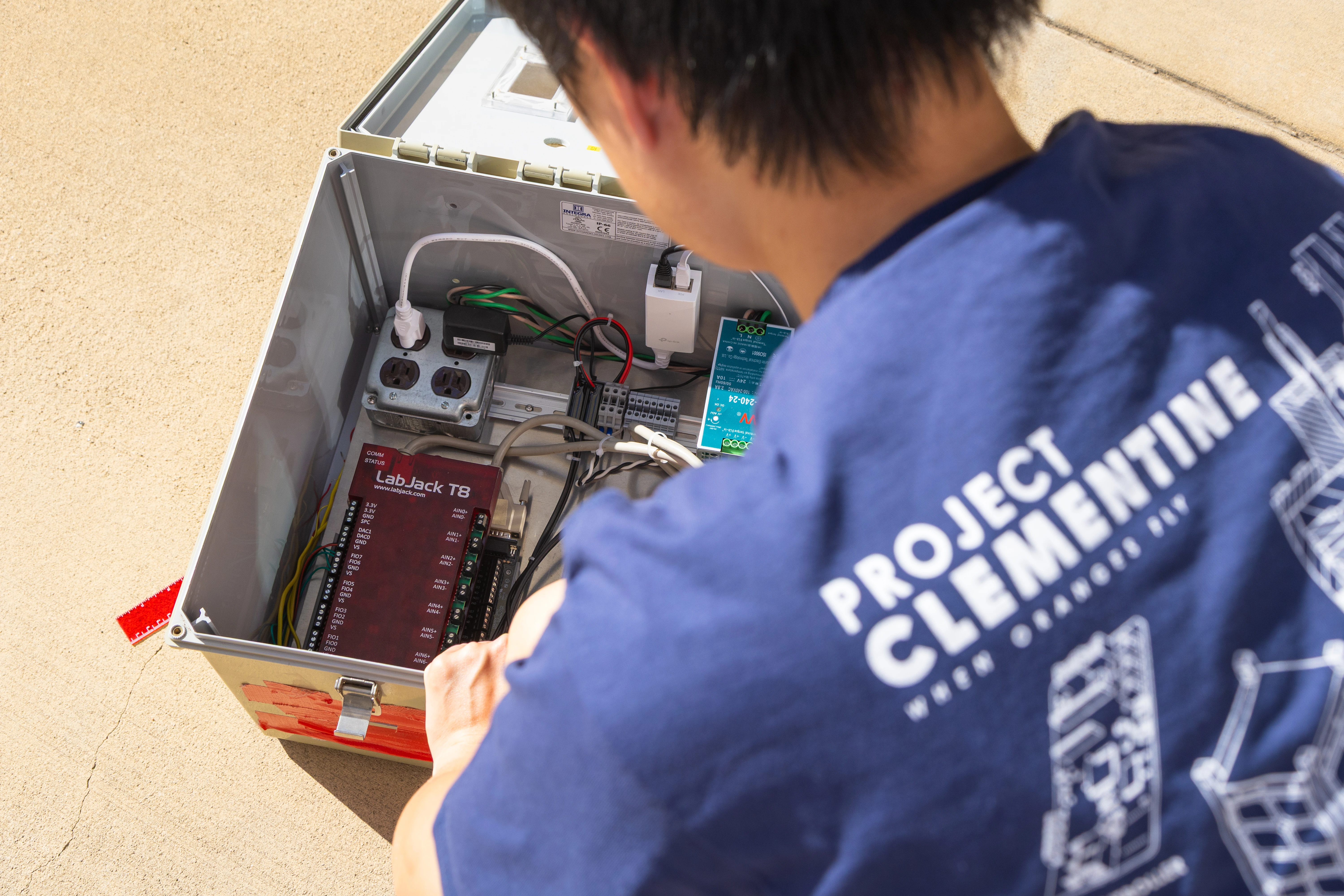 Student working on ground support electronics